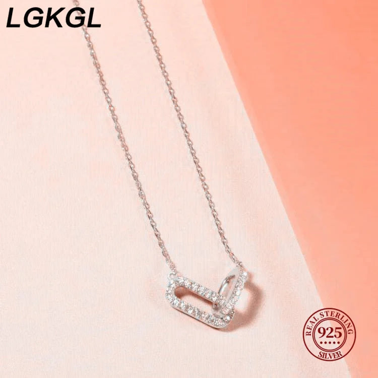 New S925 sterling silver double oval necklace interlocking double ring pendant with diamonds plated with 14k gold - Floq & Raman