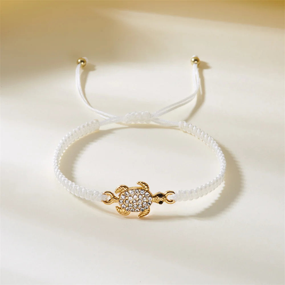 Women’s Adjustable Sea Turtle Bracelet – Gold Color, Rhinestones, Hand-Knitted Rope Chain | Summer Gifts - Floq & Raman