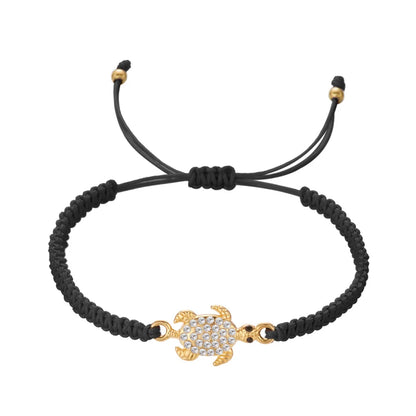 Women’s Adjustable Sea Turtle Bracelet – Gold Color, Rhinestones, Hand-Knitted Rope Chain | Summer Gifts - Floq & Raman