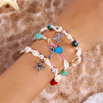 Dolphin, Starfish & Shell Pendant Bracelet – Conch Beads, Zinc Alloy, Adjustable | Summer Jewelry for Women - Floq & Raman